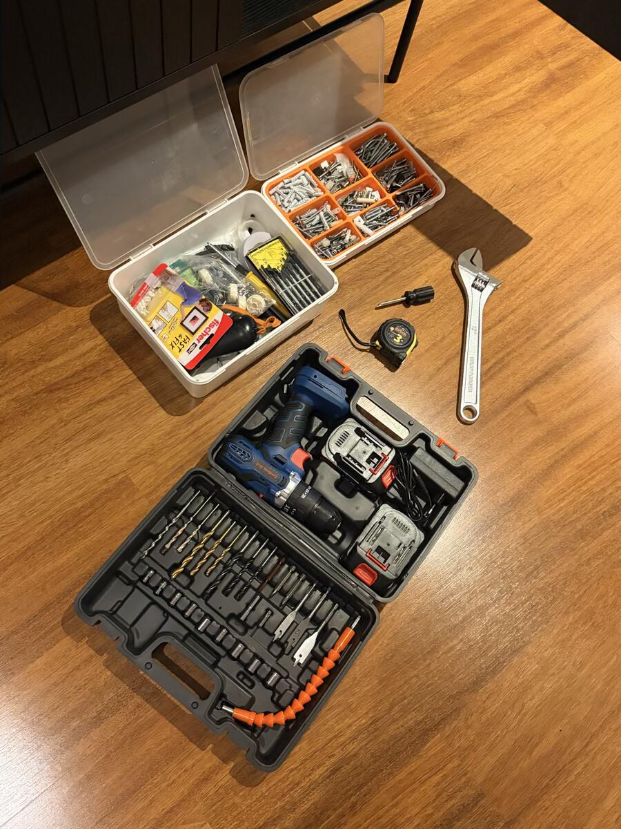 Basic renter maintenance toolkit: flashlight, microfiber cloth, screwdriver, painter's tape, and dish soap